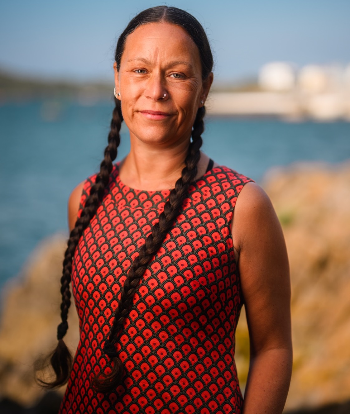 Senior Research Fellow Dr Nova Mieszkowska smiling with coast backdrop