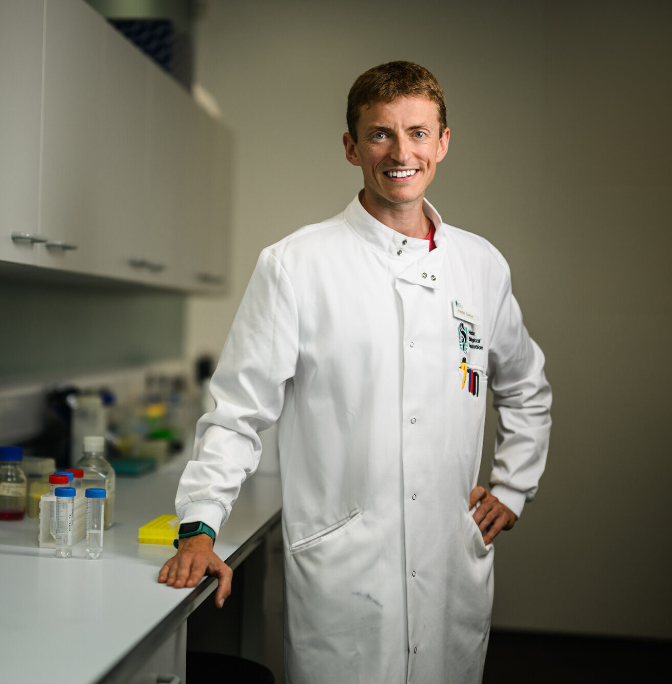 Keelan Lawlor smiling in laboratory