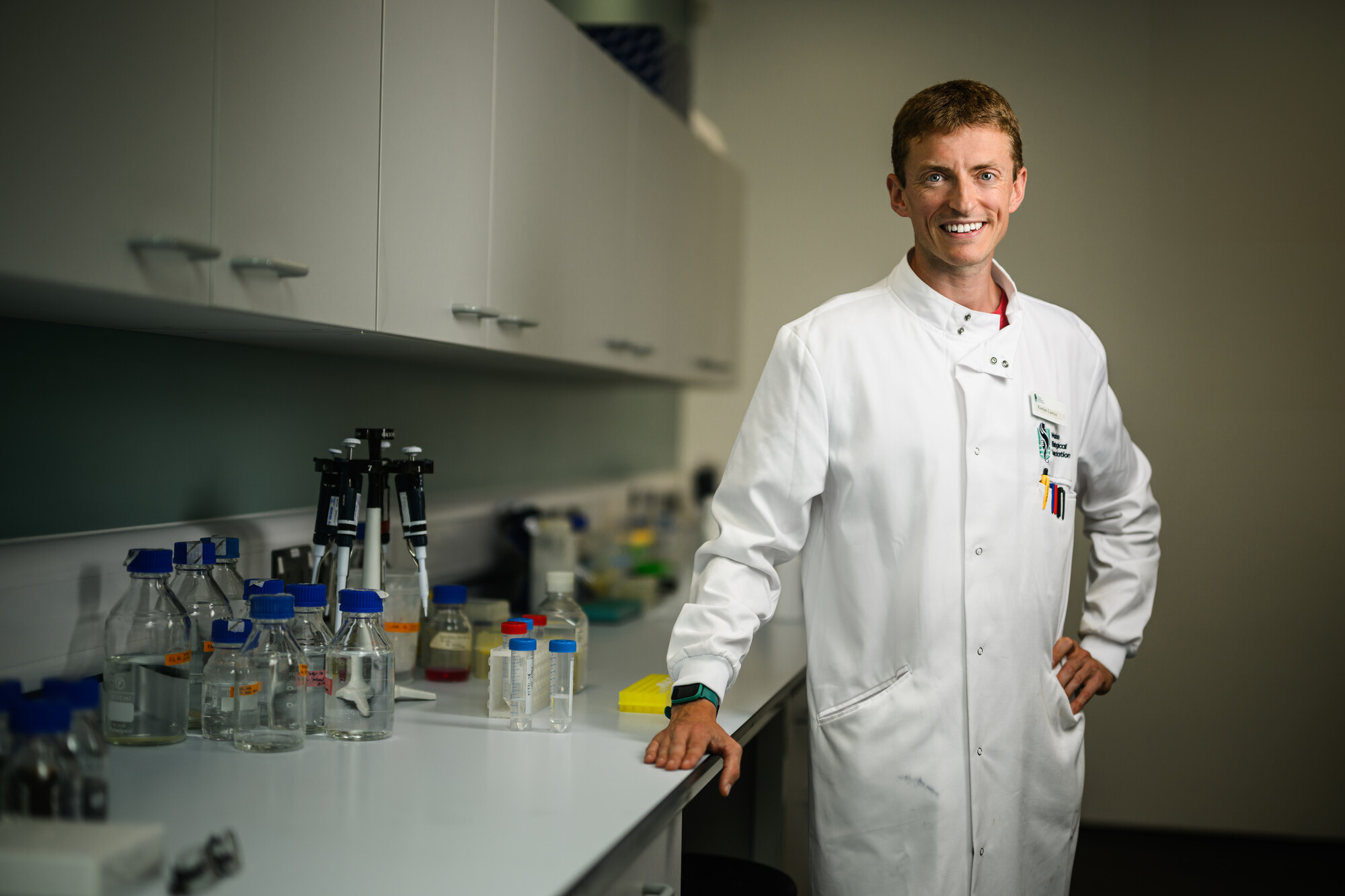 Keelan Lawlor smiling in laboratory