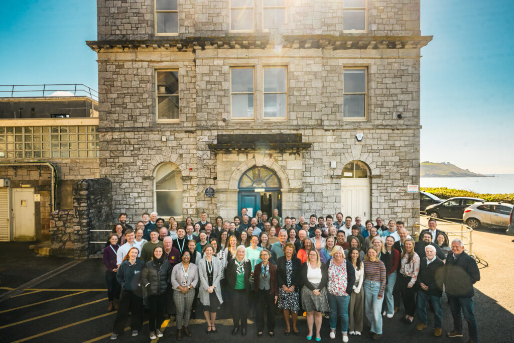 Group photo of MBA staff outside Citadel Hill building for the 140 Birthday celebrations in 2024