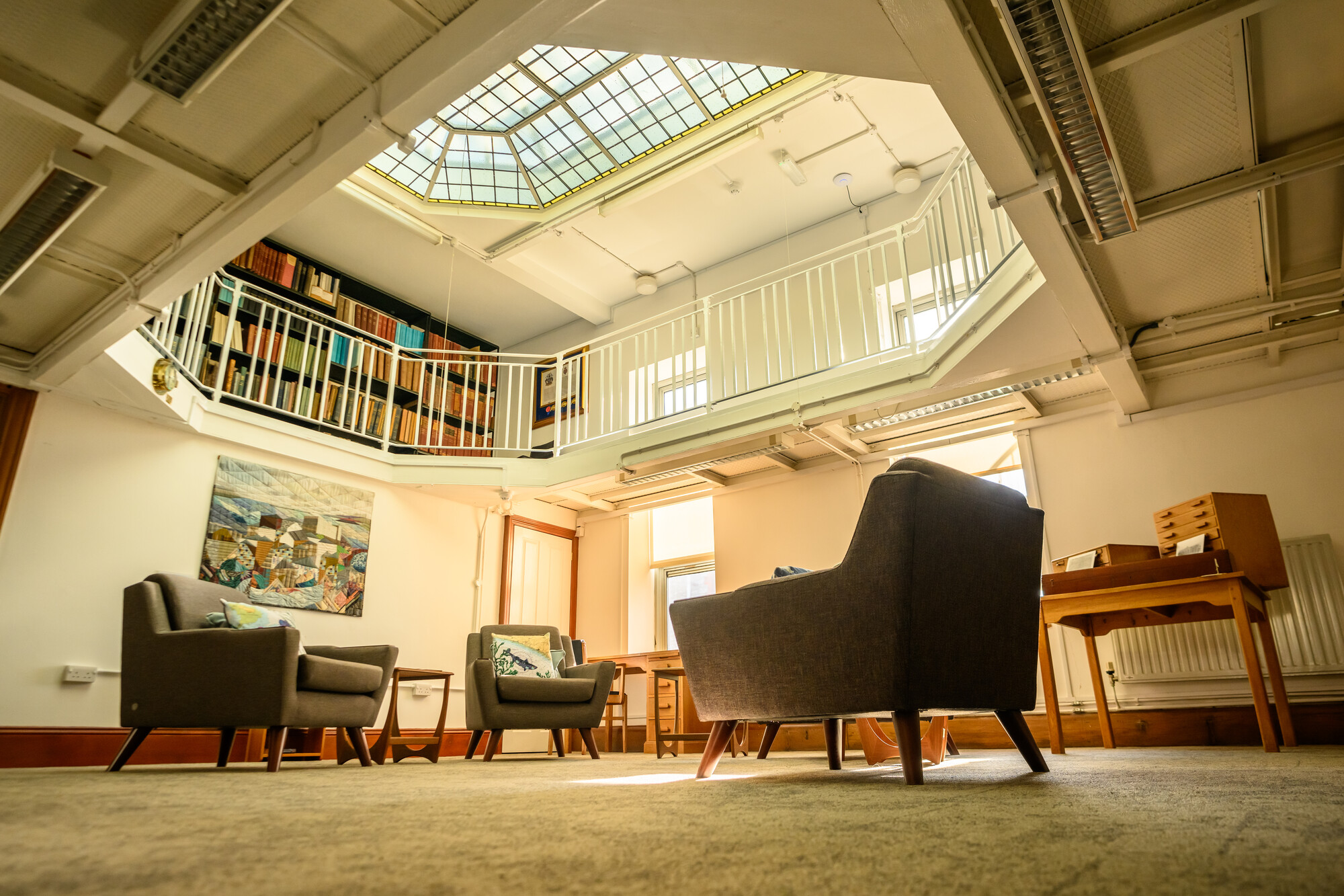 The Marine Biological Association Library MBA Library with comfy seats surrounded by books and sunlight